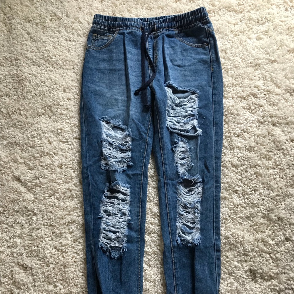 Distress denim jeans